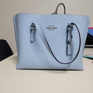 Blue coach purse barely used in great condition